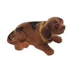 Собачка з хитаючий головою коричневий