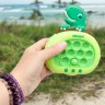Электронная игра "Finger Press Pop-It Console: Динозаврик"