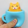 Игрушка антистресс "Кошка в чашке" голубая