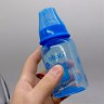 Бутылка цветная 125 мл с силиконовой соской МОНСТР (СИНЯЯ)