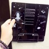 Підставка для книг металева Кіт у космосі  чорна